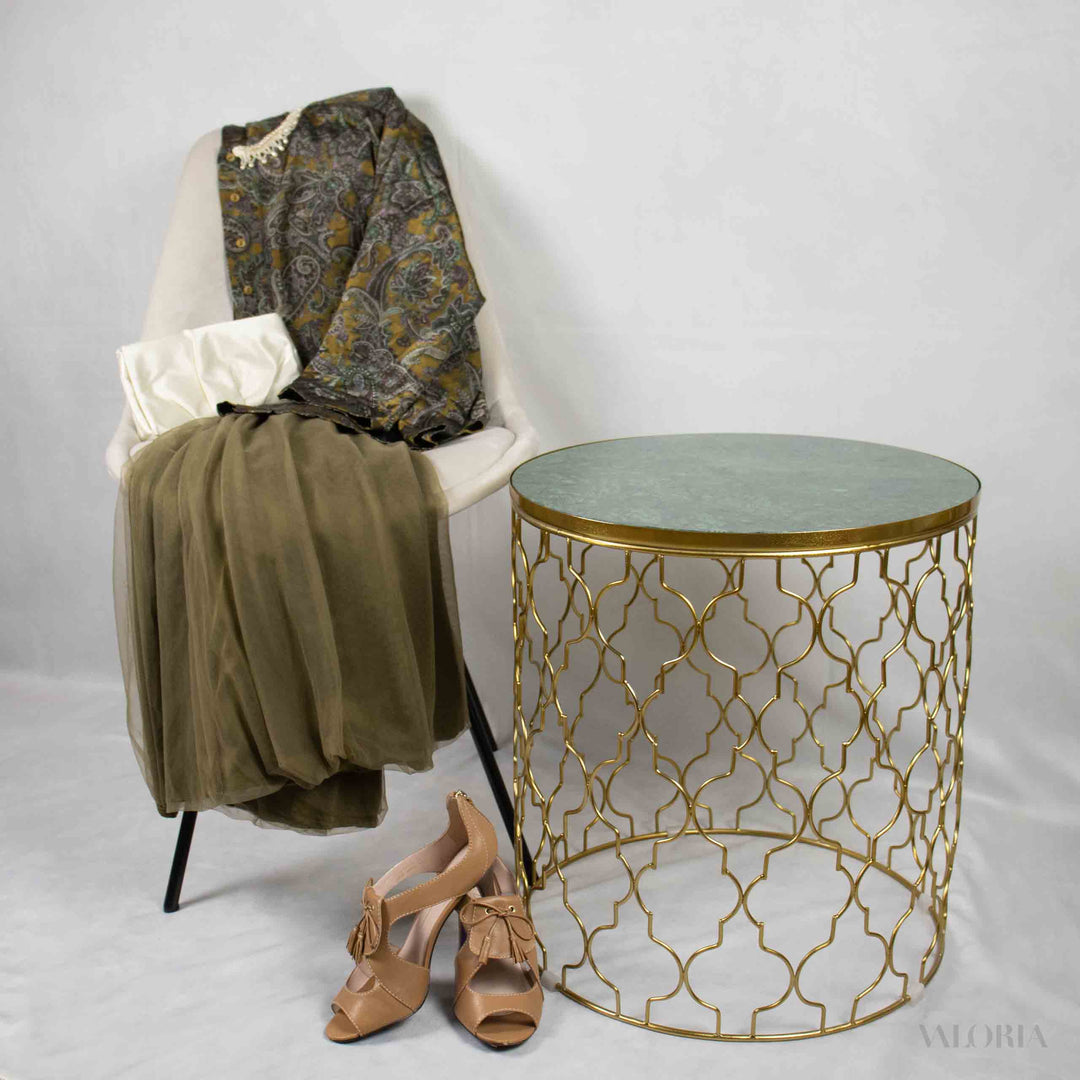 outfit-prepared-on-chair-next-to-stone&metal-table